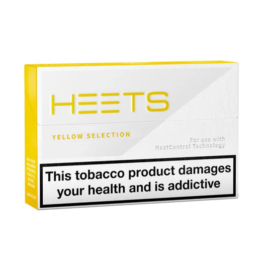 HEETS yellow selection packaging with health warning label on a white background